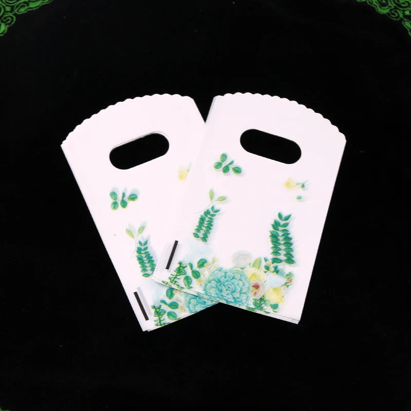 Wholesale 50Pcs/Lot Plastic Bag 9x15cm Small Boutique Storage Candy Jewelry Packaging Bag Plastic Gift Bags With Handle