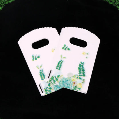 Wholesale 50Pcs/Lot Plastic Bag 9x15cm Small Boutique Storage Candy Jewelry Packaging Bag Plastic Gift Bags With Handle