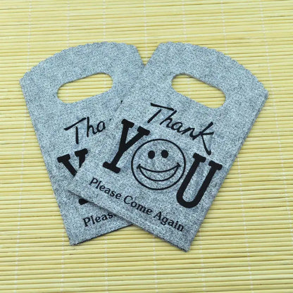 Wholesale 50Pcs/Lot Plastic Bag 9x15cm Small Boutique Storage Candy Jewelry Packaging Bag Plastic Gift Bags With Handle