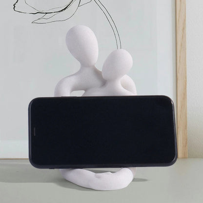 Couple embrace phone holder sculpture, resin craft decorative figurine, home decoration for bedroom, living room, study, or desk