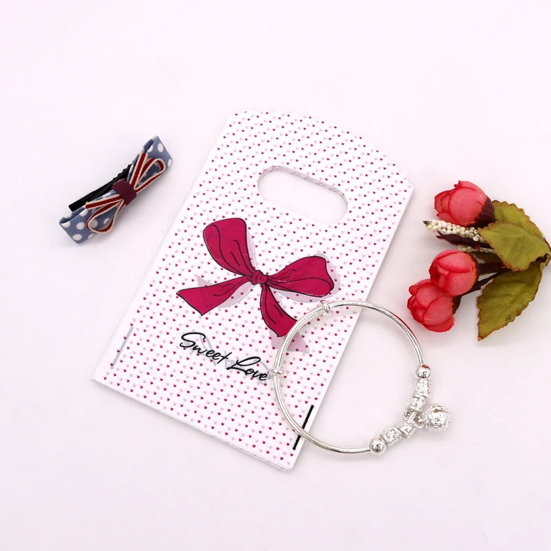 Wholesale 50Pcs/Lot Plastic Bag 9x15cm Small Boutique Storage Candy Jewelry Packaging Bag Plastic Gift Bags With Handle