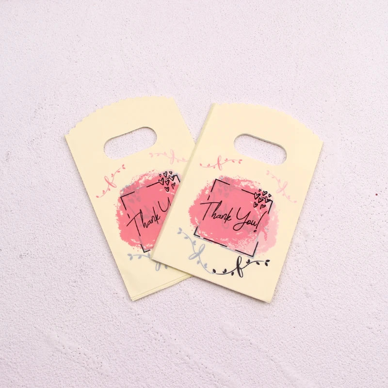 Wholesale 50Pcs/Lot Plastic Bag 9x15cm Small Boutique Storage Candy Jewelry Packaging Bag Plastic Gift Bags With Handle