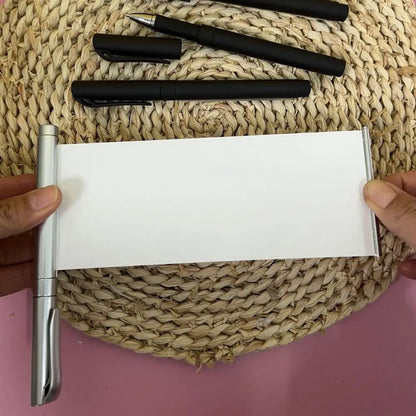 Bolígrafo Gel Negro Retráctil – Papel en Blanco Scroll