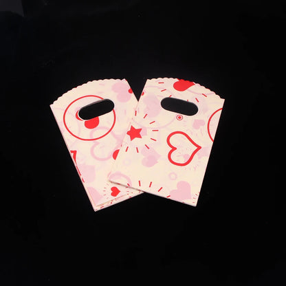 Wholesale 50Pcs/Lot Plastic Bag 9x15cm Small Boutique Storage Candy Jewelry Packaging Bag Plastic Gift Bags With Handle