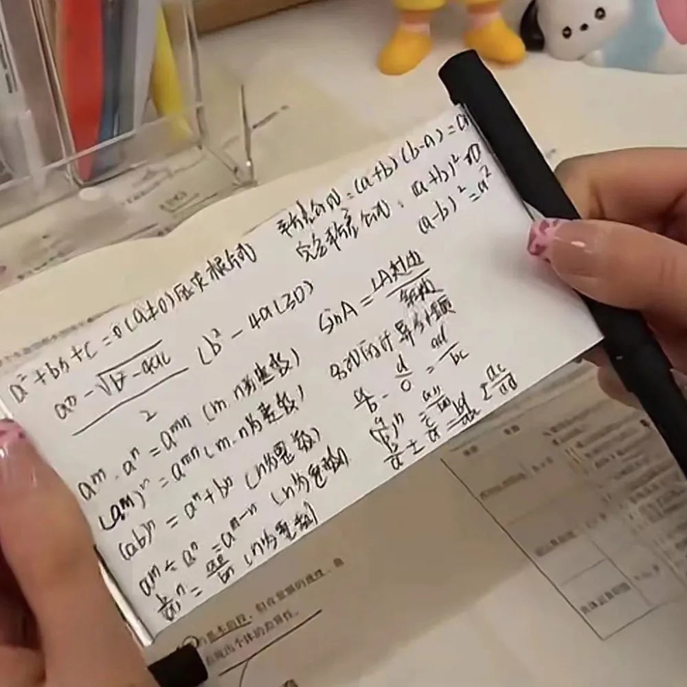 Bolígrafo Gel Negro Retráctil – Papel en Blanco Scroll