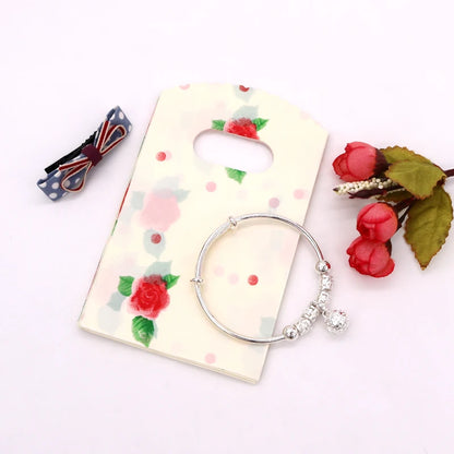 Wholesale 50Pcs/Lot Plastic Bag 9x15cm Small Boutique Storage Candy Jewelry Packaging Bag Plastic Gift Bags With Handle