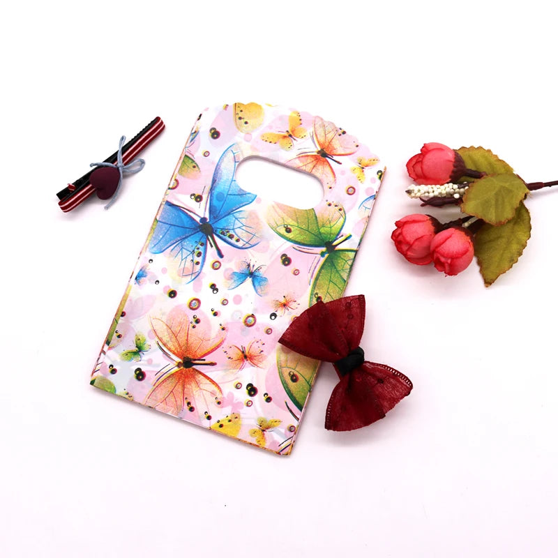Wholesale 50Pcs/Lot Plastic Bag 9x15cm Small Boutique Storage Candy Jewelry Packaging Bag Plastic Gift Bags With Handle